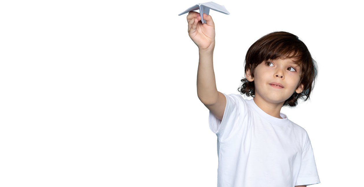 Child holding a paper airplane